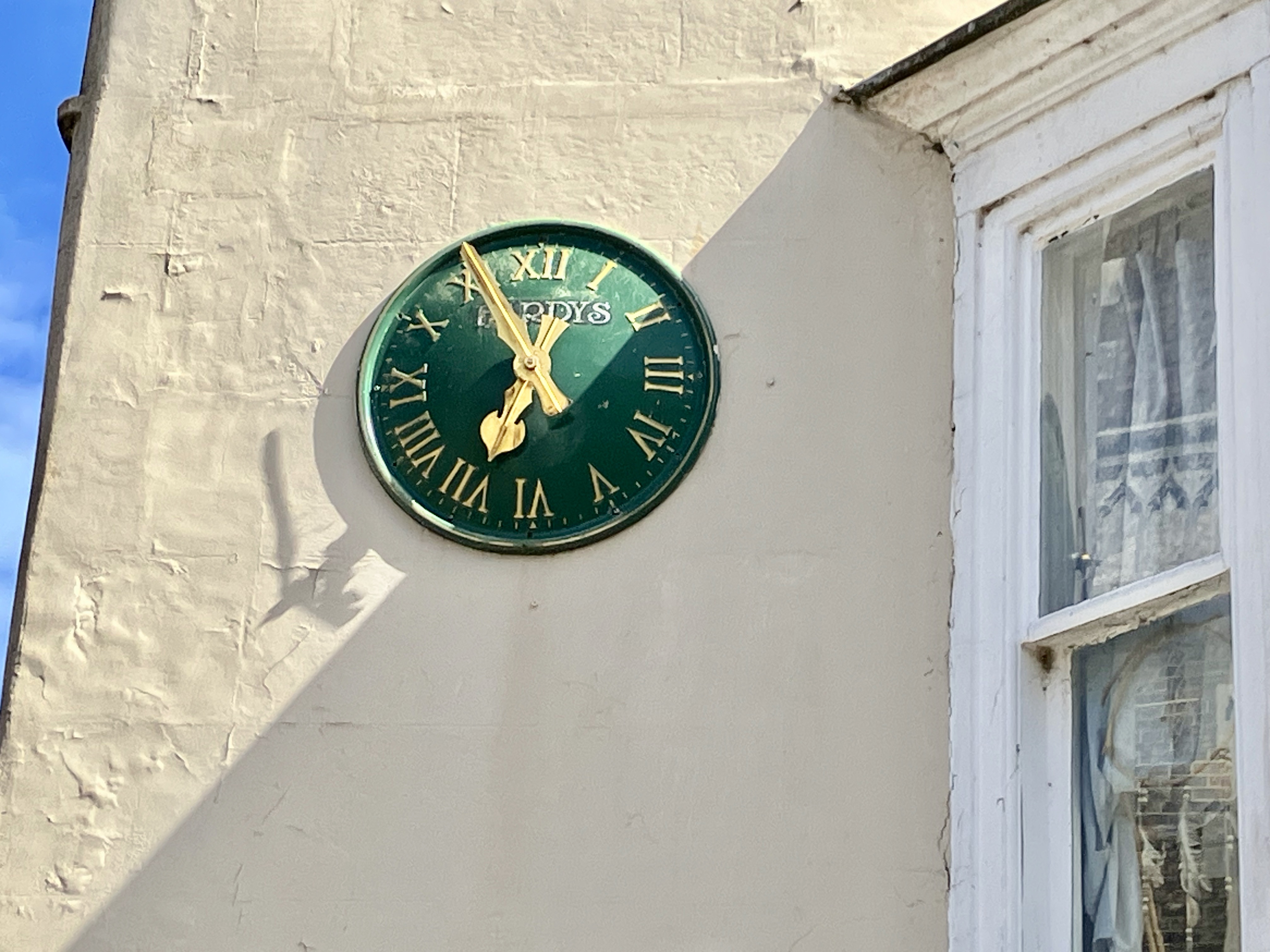 Dorchester Jewellers — stopped public clock