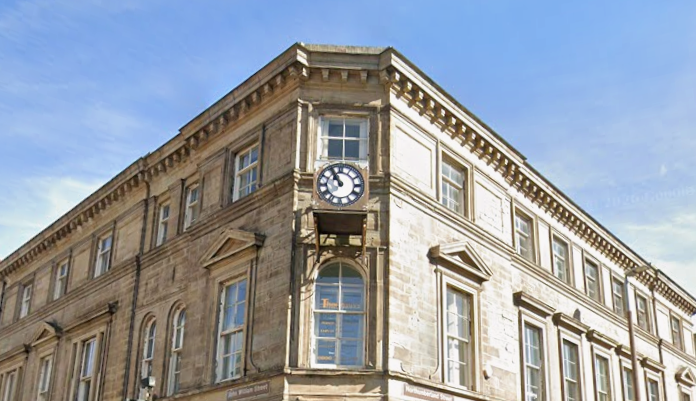 Stopped on John William St, Huddersfield — stopped public clock
